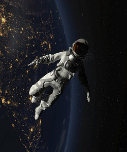 重力星体宇航员在有地球背景的太空中行走3D使航天员在有地球背景的太空中行走幻想图片