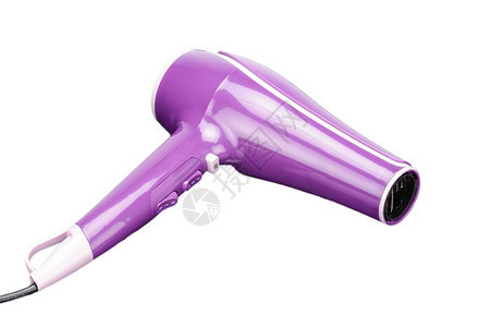 美丽器具用于发沙龙或理店的粉红色电动手持式吹风机在白色背景上隔离粉红色的吹风机在白背景上隔离扩散器图片