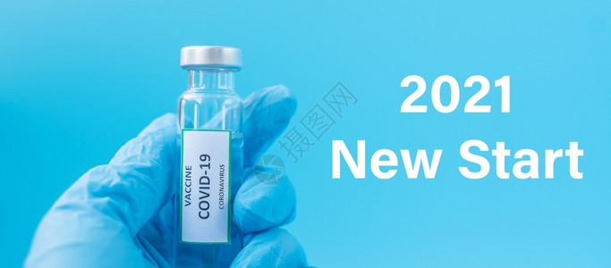 新冠201年欢庆新医院实验室疗保健接种疫苗和免概念中NitrileGrove医生用COVID19疫苗瓶对付Corona感染的Co图片