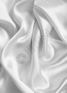版税质地平滑优雅的白色丝绸可用作婚礼背景曲线图片