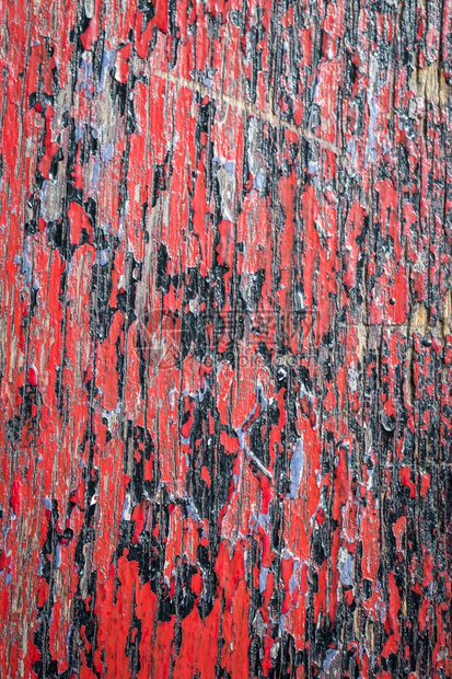有质感的老红色和黑漆的木色材料抽象的图片