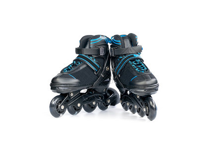 速度儿童对等新的内线滑冰鞋在白色背景上被孤立鞋类黑色的图片