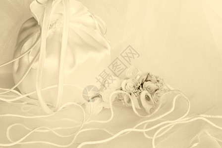 珠子新娘面纱上的结婚礼花装饰品订已背景图片