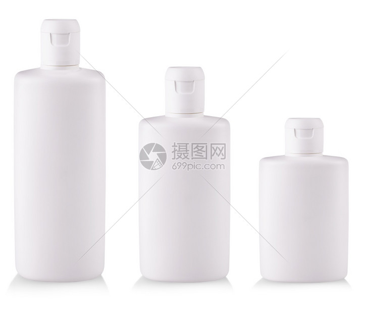 白色背景上反射的带肥皂或洗发水的白色塑料瓶背景上反射的带肥皂或洗发水的白色塑料瓶健康凝胶帽图片
