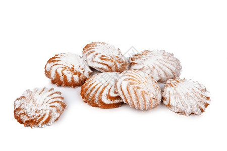 几种口水短面包饼干白底绝缘的糖粉和白面上剪裁果白色的图片