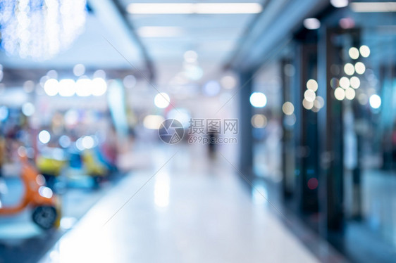Bokeh抽象地模糊了购物综合店内部的光线DP商店背景里面入口杂货店图片
