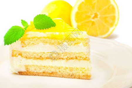 盘子绿色黄的柠檬奶油蛋糕照片图片