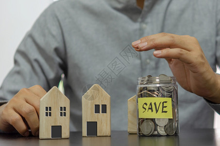 收入投资和金融商业概念节省资金以投或购买房地产投资或购买房地产钱管理图片