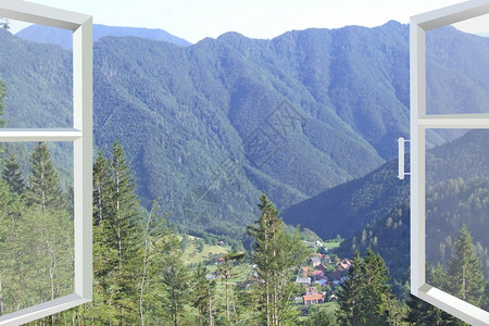 窗外的风景乡村的高山窗外景与乡村房屋山景现代窗打开自然景观山与乡村房屋间窗外打开山景与乡村房屋间窗天空背景