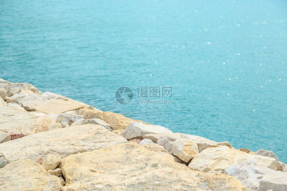 海景浪假期俯视蓝有选择地聚焦点的石头背景图片