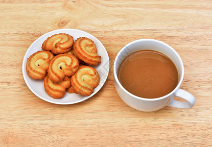 咖啡因饮料在木制桌上咖啡时间加饼干新鲜的黑暗图片