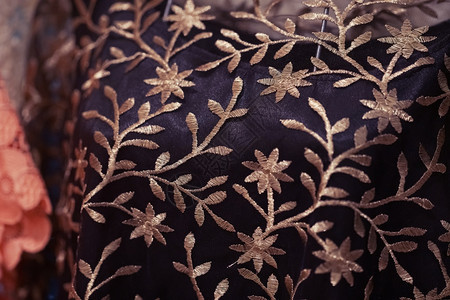 质地紧贴手工艺品的刺绣布具有传统型样纹理背景纺织品手工制作的图片