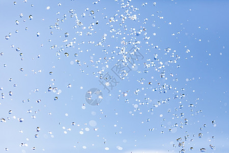 玻璃放松水色空气中的滴对着天空气中的水滴对着天空图片