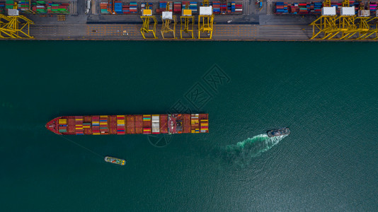 经过航海的深港集装箱船卸公海集箱船商业物流进出口货运空中俯视图卸货图片
