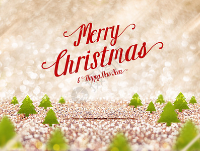 圣诞快乐和新年的短信漂浮在绿色圣诞树上在金色闪亮工作室假日欢庆贺卡魅力季节金的图片