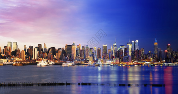 全景曼哈顿市中心新球衣的日夜现场纽约市金融的背景图片