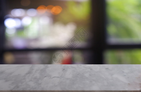 柜台空的在咖啡馆和店内部的抽象模糊背景面前白大理石桌可以用于显示或调制产品图像在咖啡馆和厅内部可用作展示或装配产品图像白色的图片