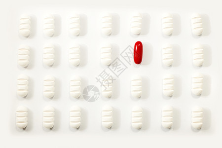 片剂许多白色药丸红的白背景动机镇痛剂图片