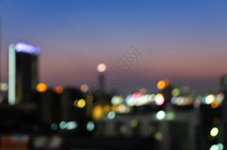 现代的清晨市中心城灯光模糊夜幕背景摘要天线闪亮的图片