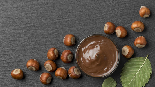 黄油木制的顶视图美味榛子巧克力分辨率和高品质美丽照片顶视图味榛子巧克力高品质和分辨率美丽照片概念坚果图片
