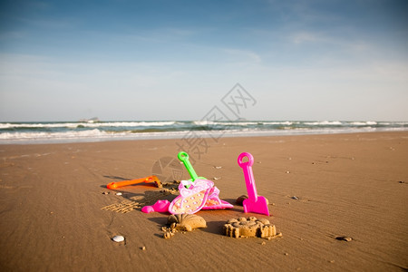 旅行闲暇目的地海滩童子军收藏中的可花儿童玩具图片