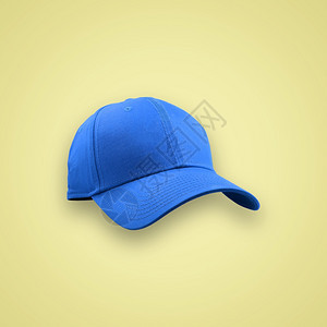 时装和体育蓝帽以美丽的糊面颜色背景隔离有剪切路径传统的运动网球图片