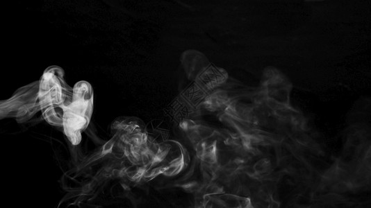 黑色暗背景解析和高品质的美丽照片在黑色暗背景下转动白烟高质量美容照片概念质量优美的照片GeneralbeautificFhoto图片