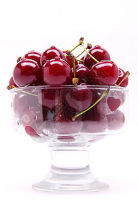 诱惑健康餐厅清新樱桃在切晶玻璃中提取新鲜樱桃隔绝在白色背景上图片