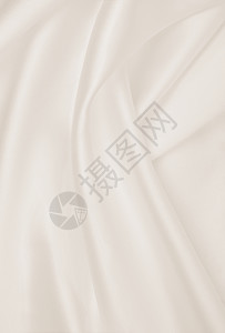材料折痕平滑优雅的金丝绸或席边奢华布质料可用作婚礼背景彩色设计用在SepiatonedRetro风格上布料图片