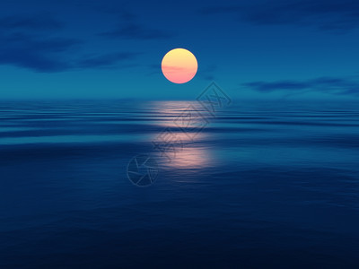 反射支撑蓝色的海洋上美丽日落的景象图片