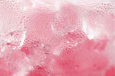 寒冷的磨砂冰粉色纹理有选择聚焦点a淡水冷冰粉红色纹理有选择焦点气泡图片