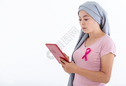 卫生保健使用白空复制间工作室背景保健医疗概念的片断用粉红乳癌认识丝带描绘一个有粉红乳腺癌意识的亚洲妇女肖像白色治疗图片