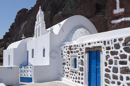 希腊圣托里尼岛红滩教堂的希腊语叉天际线图片