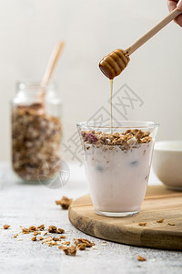 奶油甜的高清晰度照片前观面酸奶和花粉蜂蜜高品质照片优美度手图片