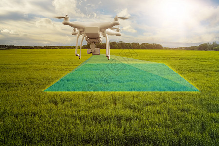 绿色粮食以高分辨率数码相机在农作物田业概念上飞行的无人驾驶飞行器多机扫描图片