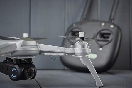 飞机小素材创新带有高分辨率相机和双频无线电控制的用于获取空中图像的高分辨率摄机和无线电控制的四式引擎无人驾驶飞机的侧面视图直升机车辆背景