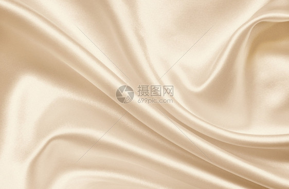 平滑优雅的金色丝绸或纹质可用作SepiatonedRetro风格的背景折痕白色调图片