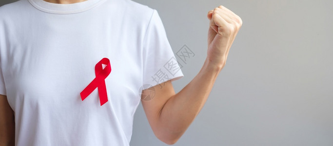 十月艾滋12月世界艾滋病日的红丝带获得免疫缺陷综合症多种骨髓瘤癌症意识月和全国红丝带周健康护理和世界癌症日概念以及全球艾滋病日测图片
