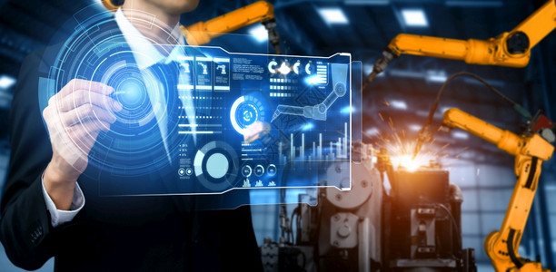 受控用于数字工业和厂机器人技术的先进机械臂系统使用连接到互联网络的IOT软件由工业程控制的自动化造机器人用于数字工业和厂机器人技图片