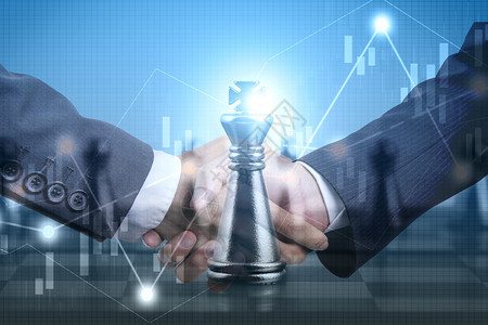 联合办公商业伙伴关系成功和战略计划概念双接触的商人在金融市场股票图表上握手并竞争象棋盘游戏比赛ECFP相信工作图片