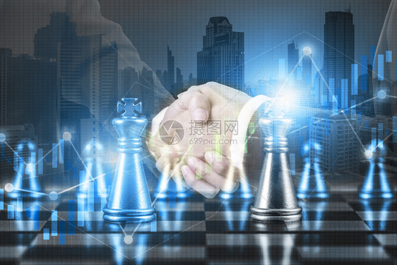 支持合同商业伙伴关系成功和战略计划概念双接触的商人在金融市场股票图表上握手并竞争象棋盘游戏比赛ECFP领导图片