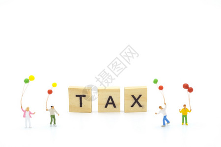 税收服务作为背景商业概念和金融的计算器当年度收入TAX其文本或设计使用复制空间于计算工具的年度收入TAX用作背景商业概念和财务纸时间账单背景
