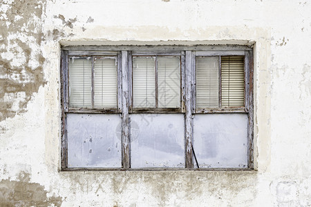 黄色的墙损坏旧弃窗废墟中房屋户的详情驱逐和遗弃危机等图片