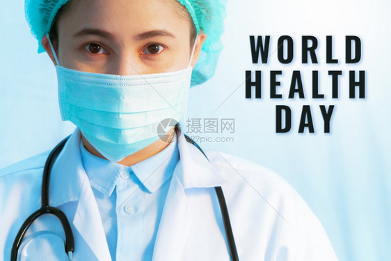 保护的疾病世界卫生日概念Corona停止感染年轻女医生佩戴抗传染病和听诊器面具的青年女医生图片