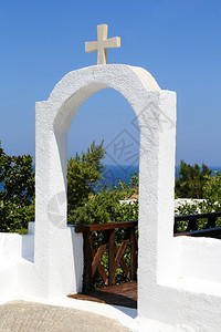 Naxos一个典型教堂的入口一种蓝色山图片