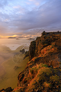 太阳维克冰岛Snaefellsnes半岛Arnarstapi地区的典型冰岛日出落悬崖景观旅行图片