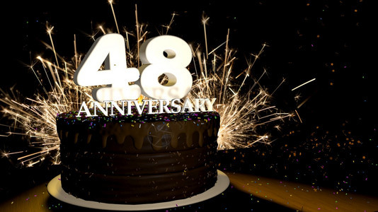 渲染颜色周年纪念48卡圆形巧克力蛋糕装饰着蓝色红黄绿的糖衣杏仁木桌上有白色数字背景是人造火星和彩色糖衣丸落在桌子上3D插图周年纪图片
