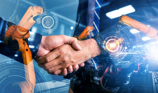 合伙人造的机械化工业器人手臂和商务握双曝光人工智能成功协议的概念用于未来工厂的业革命和自动化过程机械工业器人手臂和商务握双曝光o图片