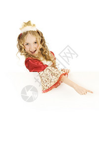 东框架美丽的笑小女孩长着金头发的美丽女孩穿着公主服装展示标志纸万圣节高清图片素材