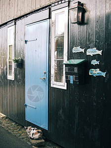 投币口吨在StreymoyCat岛法罗群首都Torshavn老城的Tinganes上典型老房子的装饰细节见于门前贺卡主机世界图片